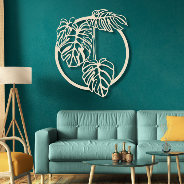 Wanddekoration aus Holz in runder Ausführung mit einem Monstera Motiv